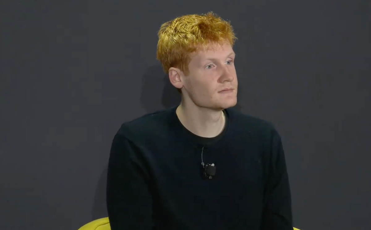 SpaceX logo with AI coding imagery